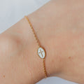 Armband mit weißem Kreuz - 16 Karat Vergoldung | Shop Nory