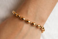 Armband aus goldfarbenem Edelstahl – Ovale Perlen, wasserdicht & langlebig | Shop Nory