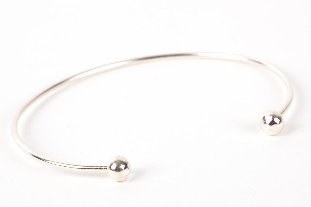 Offener Armreif mit doppelter Kugel aus Silber für Damen | Shop Nory