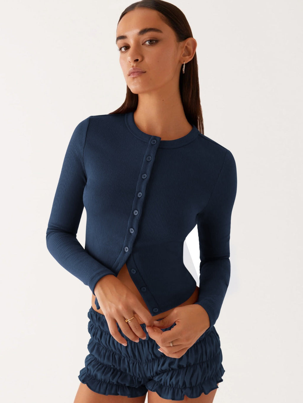 Einfarbige schmal geschnittene lange Strickjacke