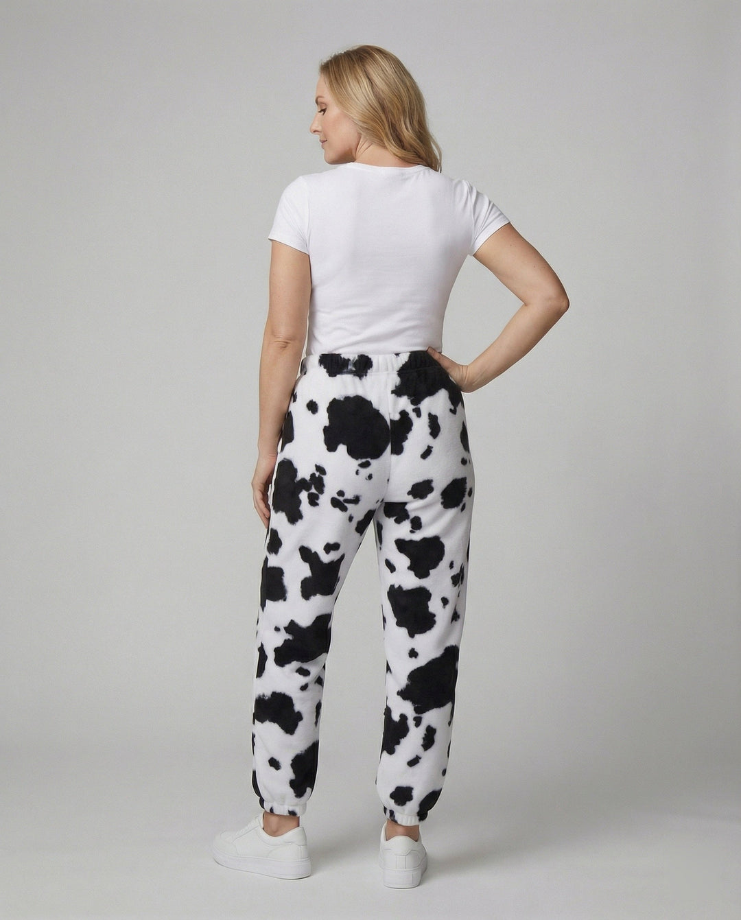 Damen Freizeithose im lässigen Cow-Print-Design mit elastischem Bund und Bündchen