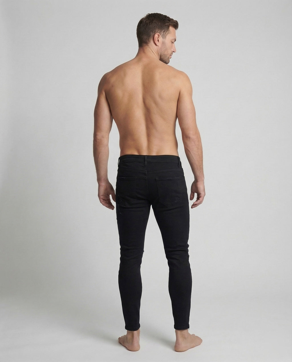 Herren Skinny Jeans mit Rissen & Saumreißverschluss