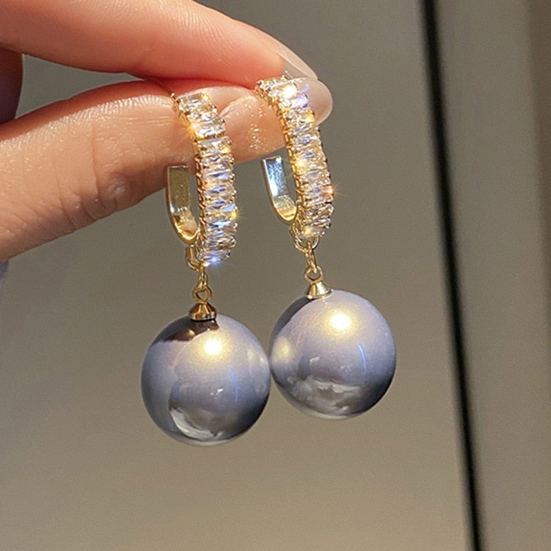 Luxuriöse Ohrringe mit Perlen und Zirkonia – Amara | Shop Nory