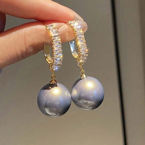 Luxuriöse Ohrringe mit Perlen und Zirkonia – Amara | Shop Nory