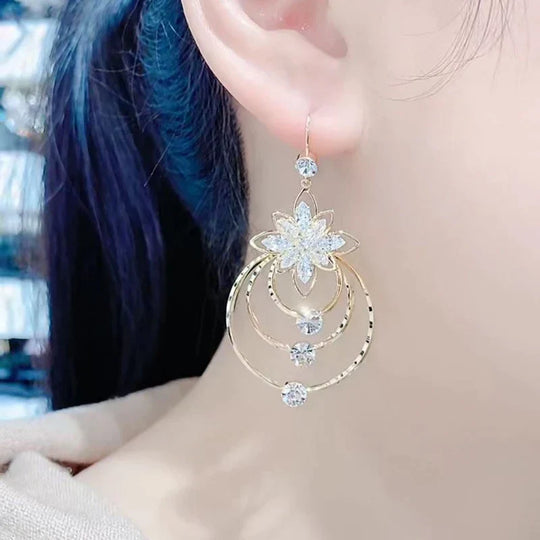 Luxuriöse goldene Creolen | Shop Nory