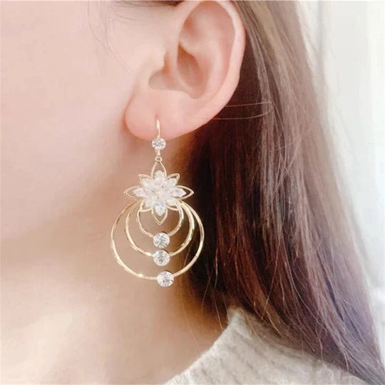 Luxuriöse goldene Creolen | Shop Nory