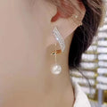 Klassische elegante Imitationsperlen Quaste Ohrringe | Shop Nory