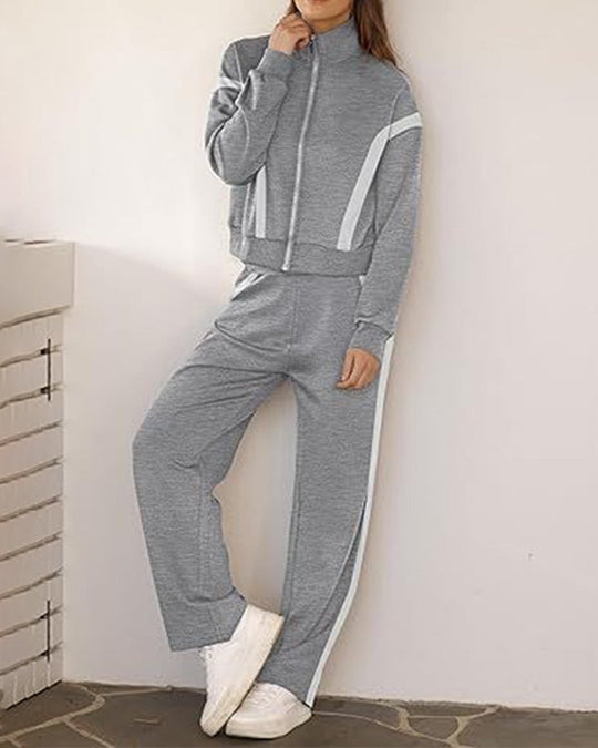 Satz mit Sporty Lässig Stil Merkmalen Von Jacke und Hosen