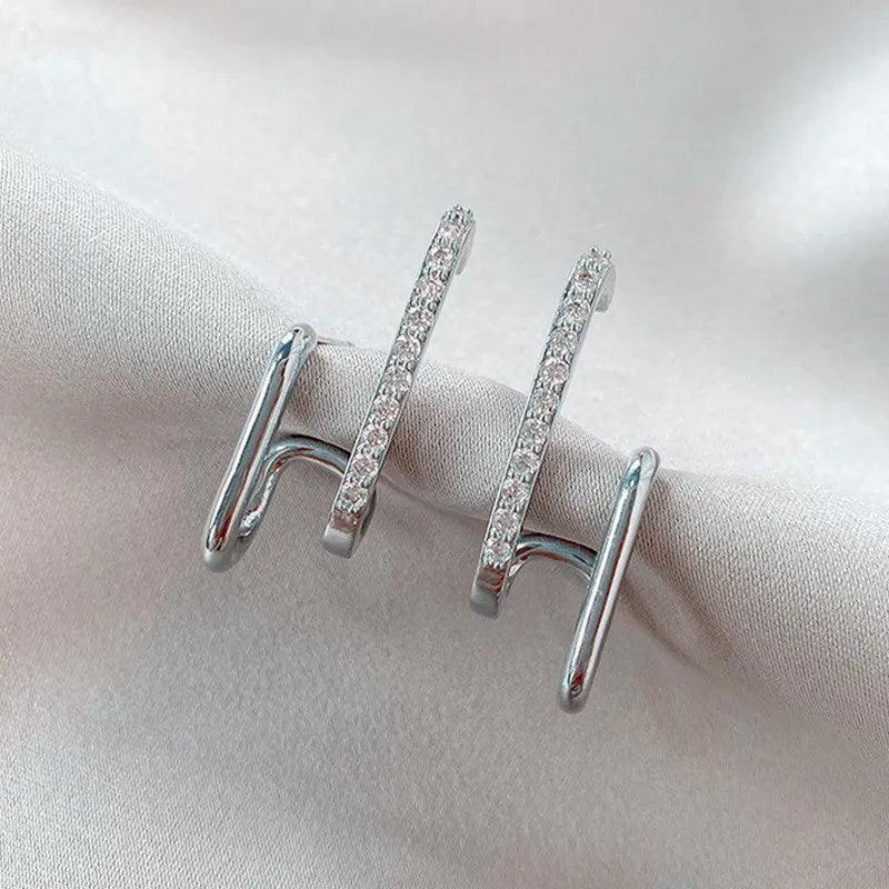 Kristallkrallen-Ohrstecker | Shop Nory