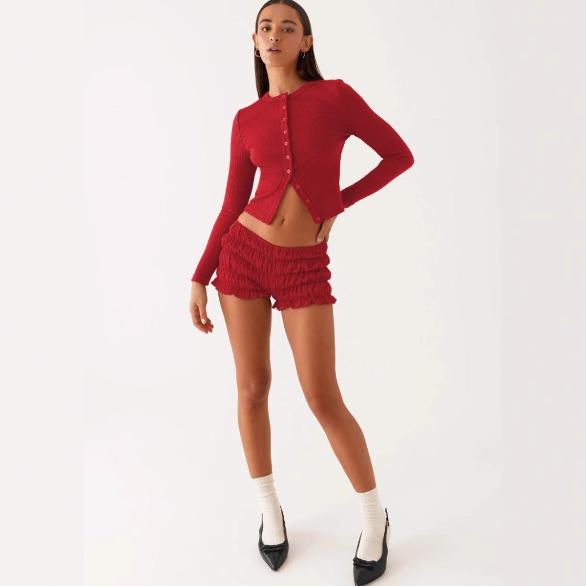 Einfarbige schmal geschnittene lange Strickjacke