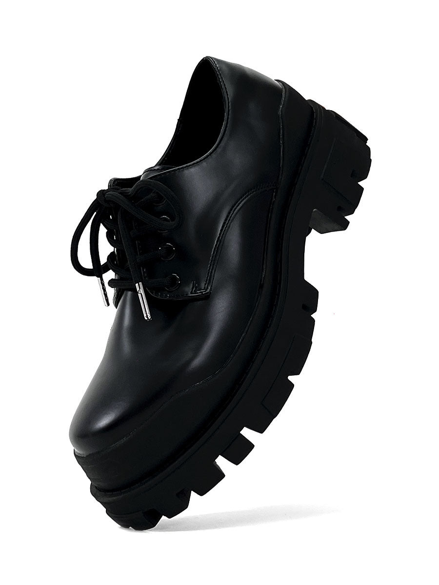 Moderne Lederschuhe mit Dicker Sohle