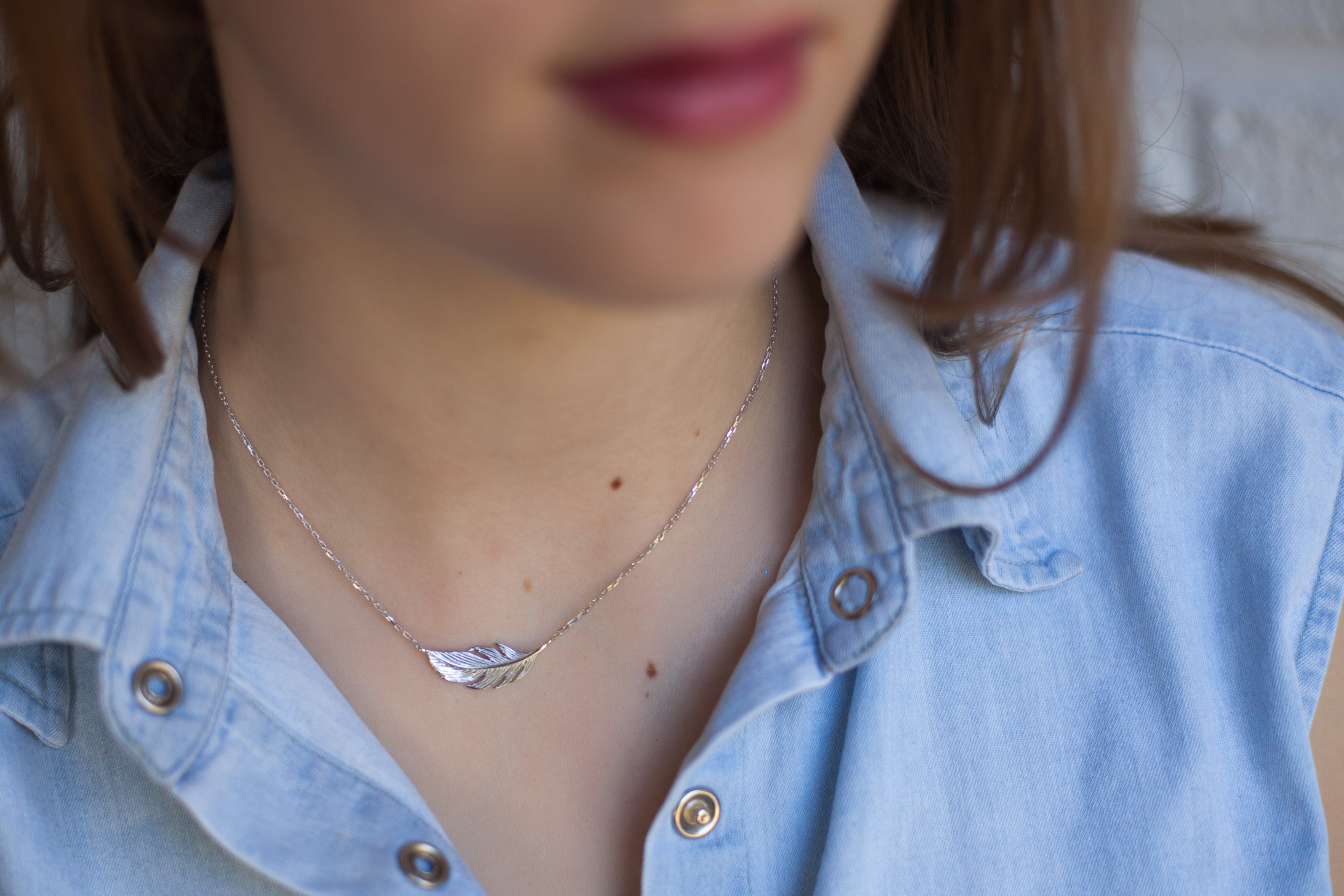 Kette mit Anhänger Feder Vogel aus Silber | Shop Nory