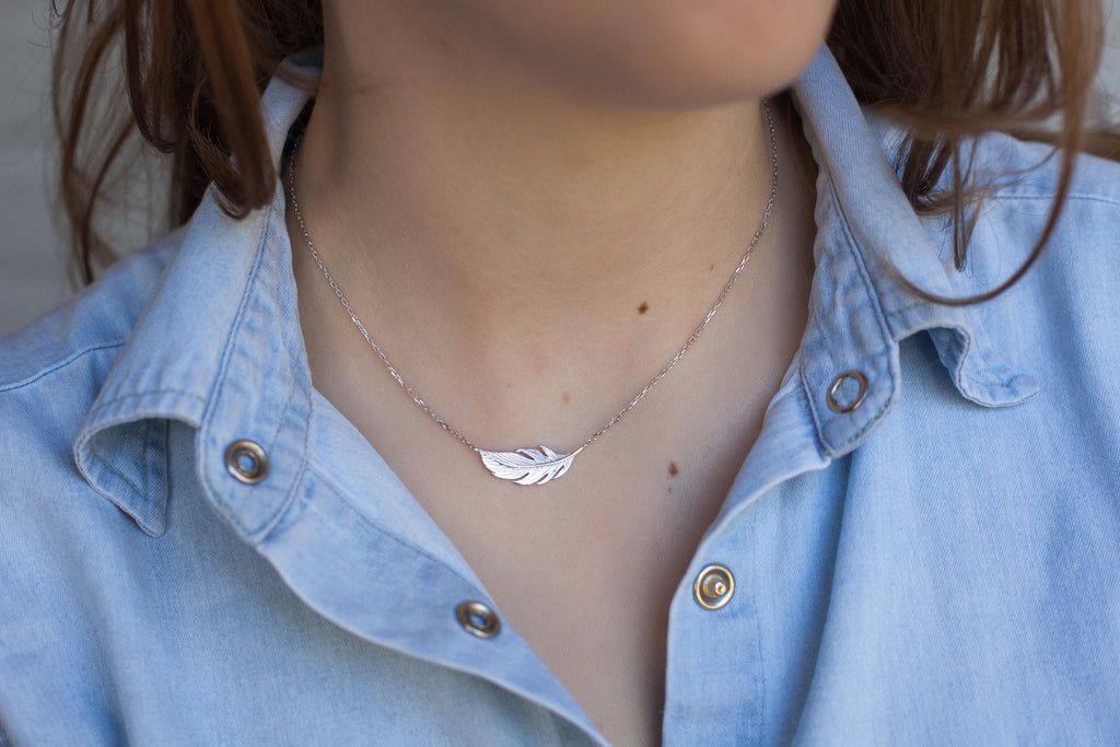 Kette mit Anhänger Feder Vogel aus Silber | Shop Nory
