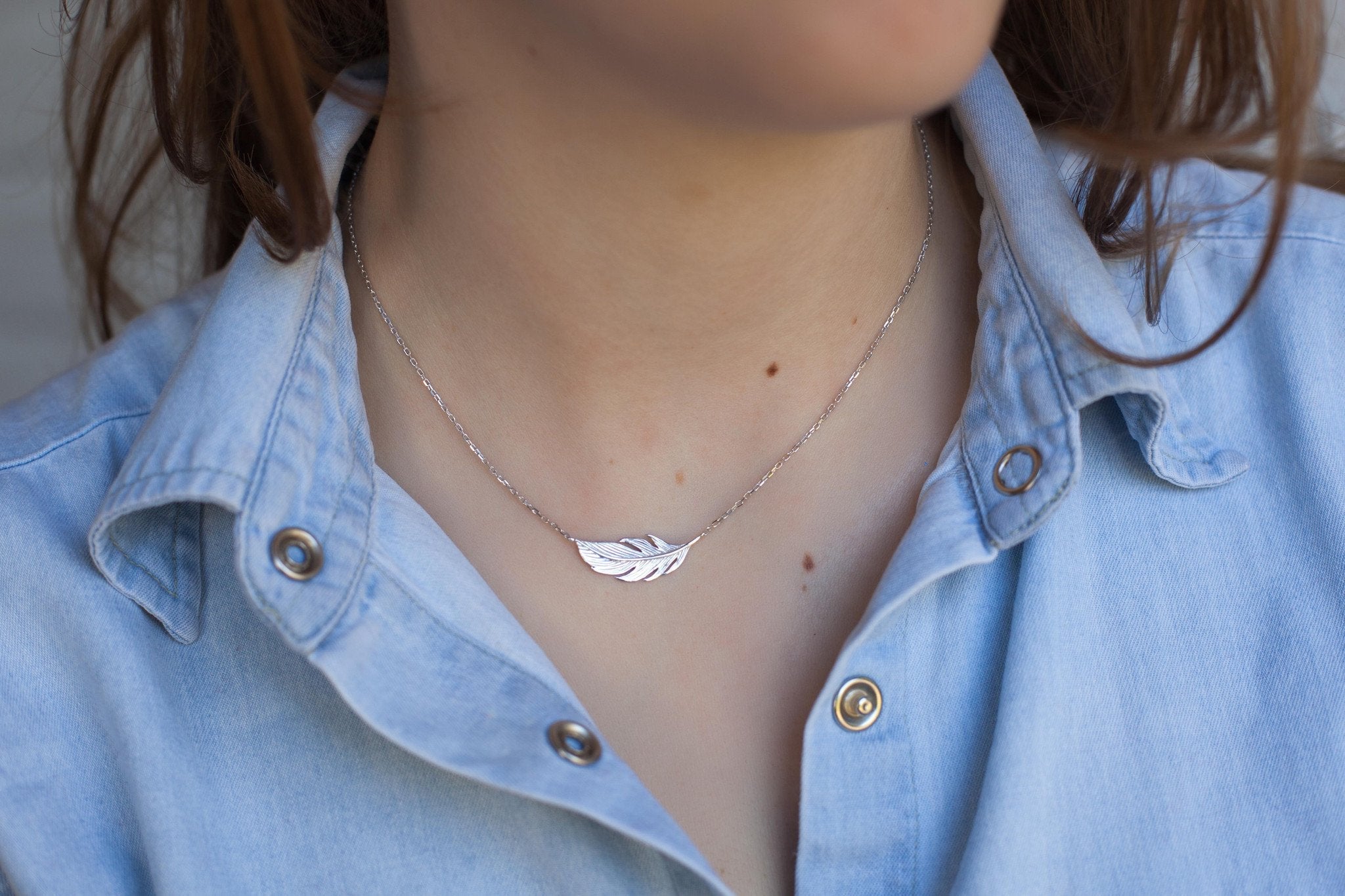 Kette mit Anhänger Feder Vogel aus Silber | Shop Nory