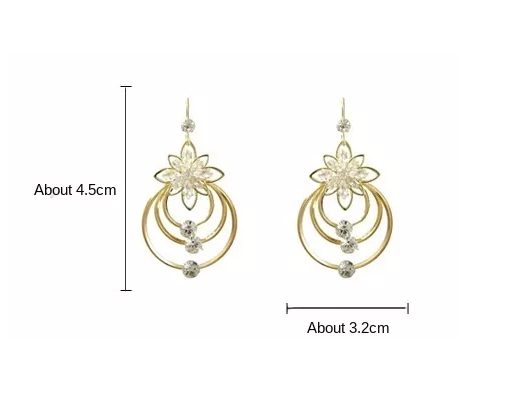 Luxuriöse goldene Creolen | Shop Nory