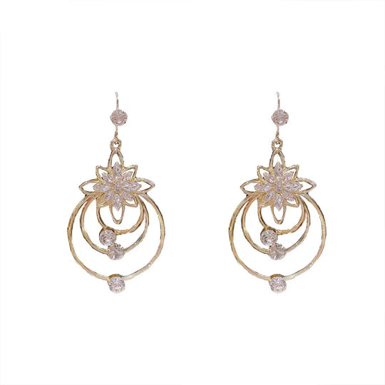 Luxuriöse goldene Creolen | Shop Nory