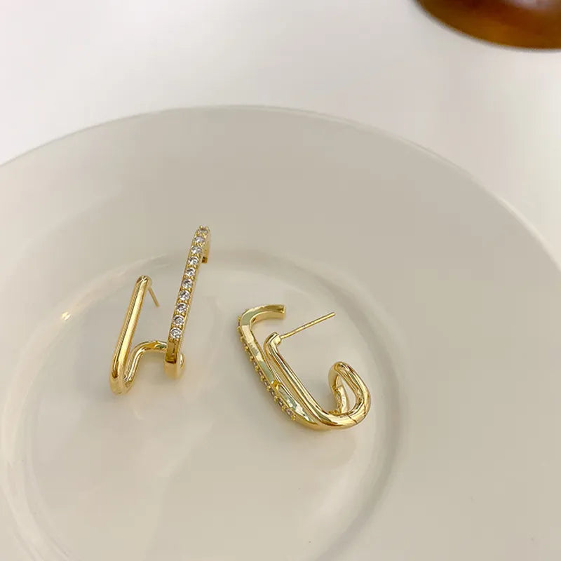 Kristallkrallen-Ohrstecker | Shop Nory