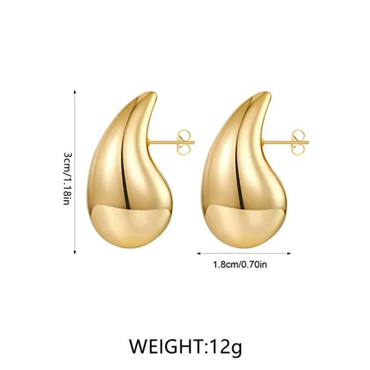 Goldfarbene Tropfen Ohrringe | Shop Nory