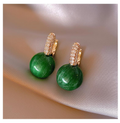 Elegante Luxusohrringe mit grünen Perlen | Shop Nory
