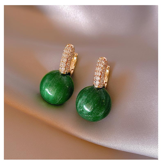 Elegante Luxusohrringe mit grünen Perlen | Shop Nory