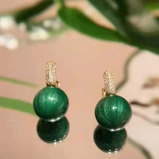 Elegante Luxusohrringe mit grünen Perlen | Shop Nory