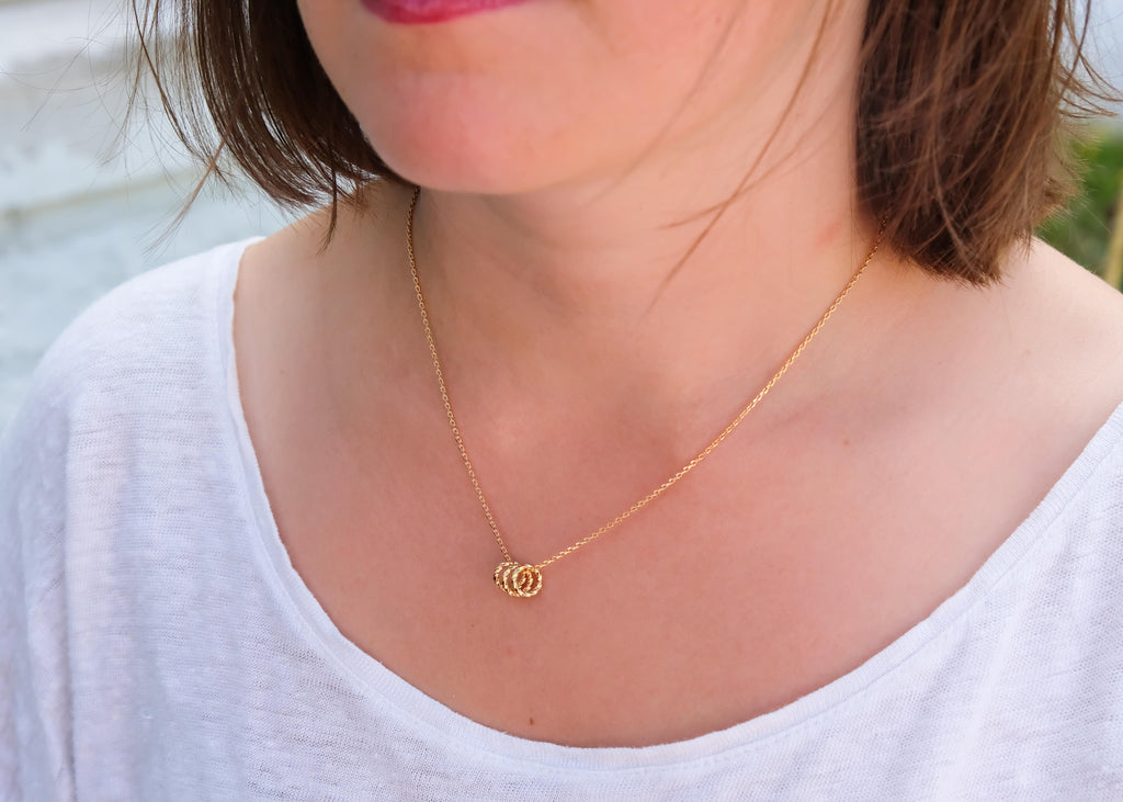 Kette mit 3 Ringen als Anhänger vergoldet | Shop Nory