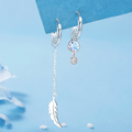 Federmondstein | Sterling Silber asymmetrische Feder Ohrringe, weißer Mondstein | Shop Nory