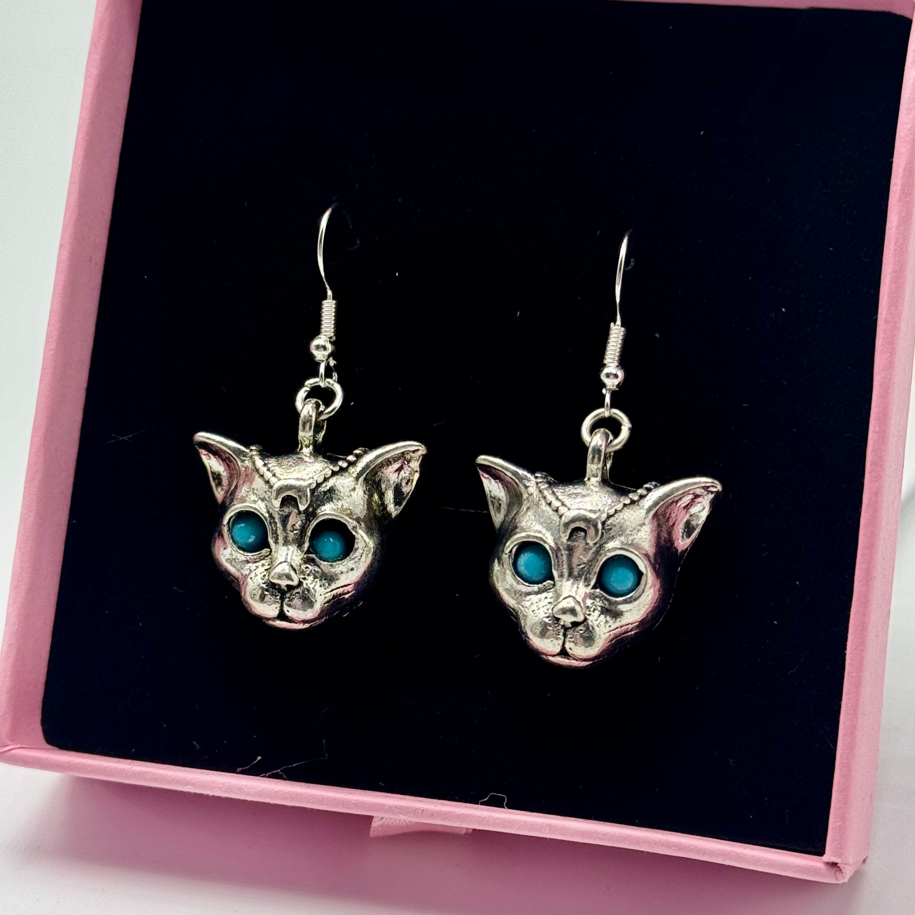 Silver Mystic Blue Eyed Leopard Charm Earrings | Shop Nory