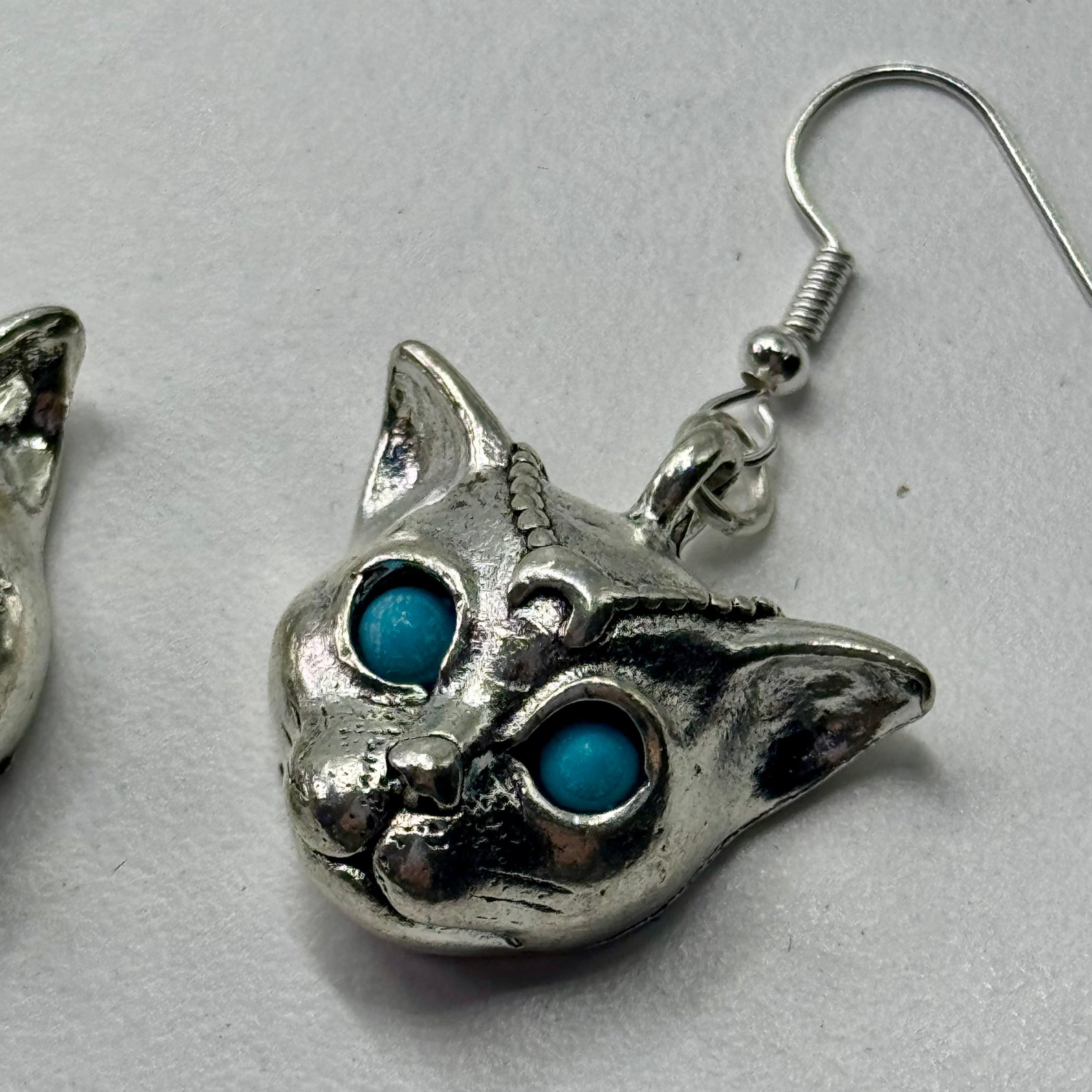Silver Mystic Blue Eyed Leopard Charm Earrings | Shop Nory