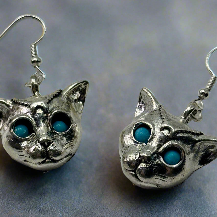 Silver Mystic Blue Eyed Leopard Charm Earrings | Shop Nory