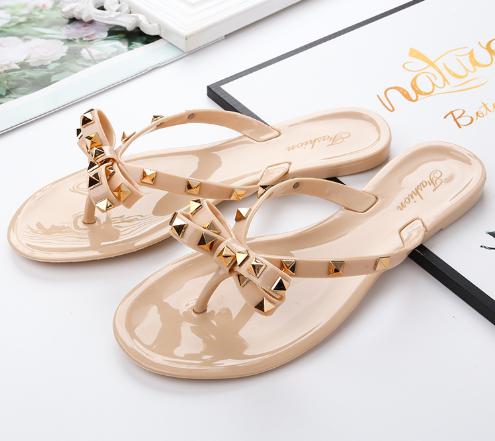 Nieten-Schleifenknoten Flip-Flops Sandalen