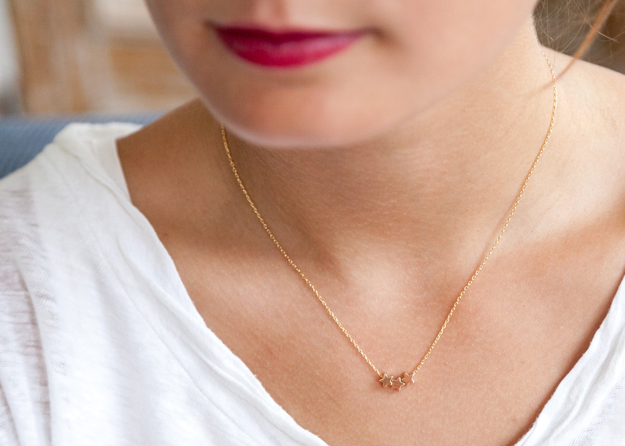 Kette mit drei glänzenden Sternen vergoldet | Shop Nory