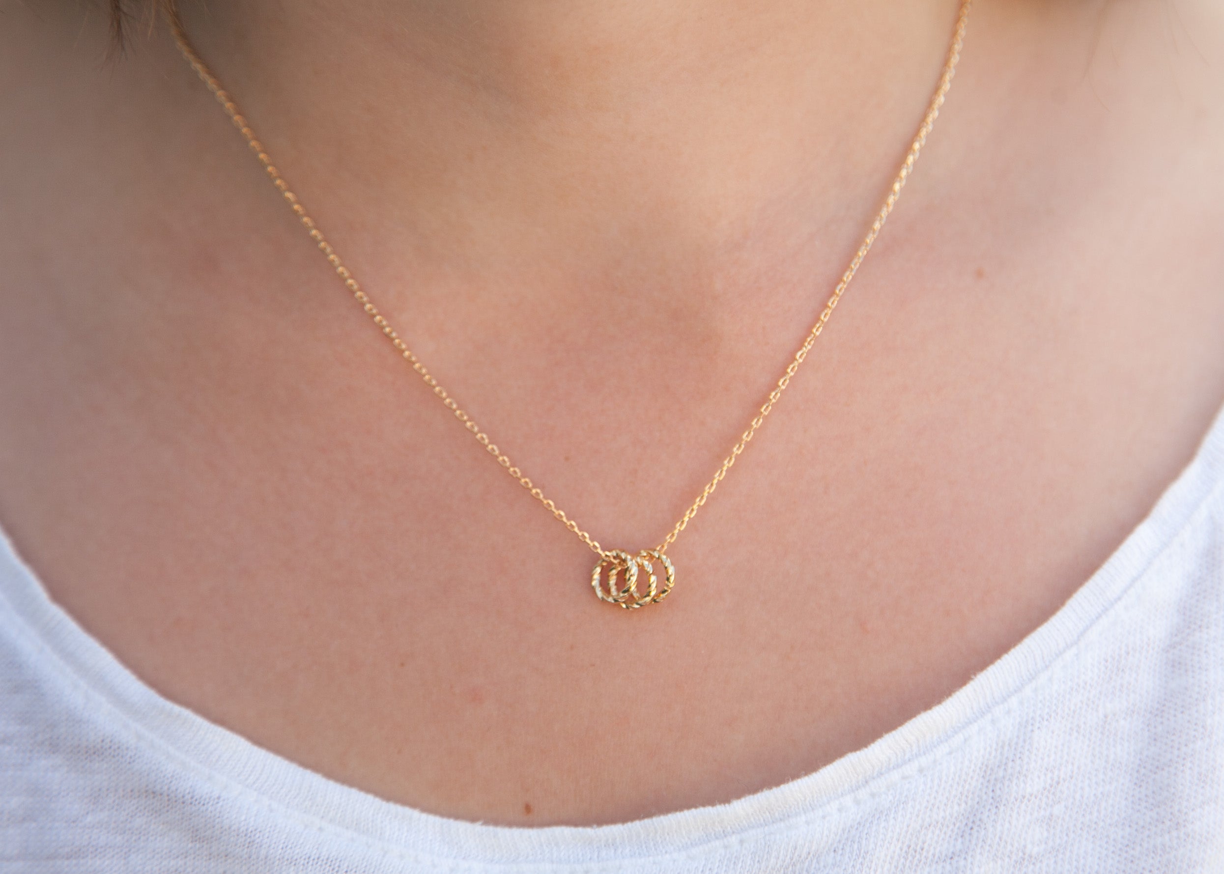 Kette mit 3 Ringen als Anhänger vergoldet | Shop Nory