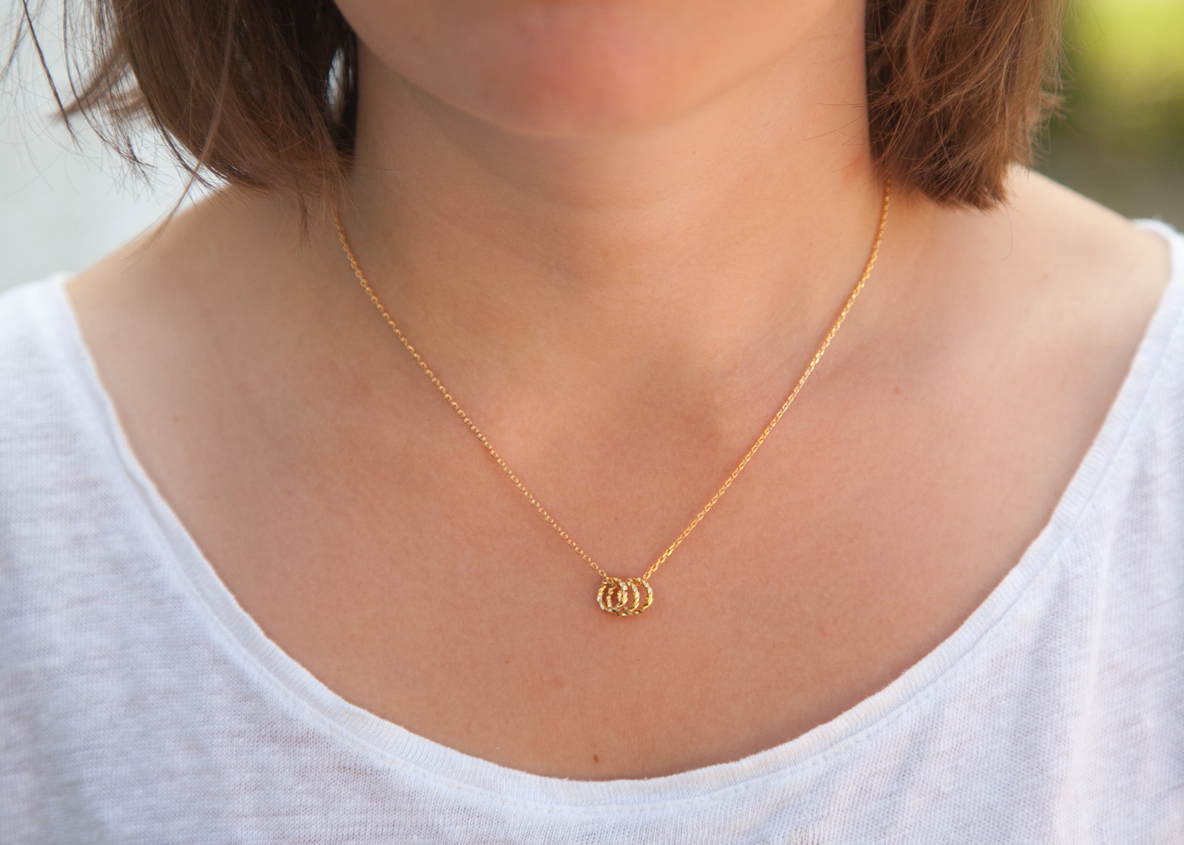 Kette mit 3 Ringen als Anhänger vergoldet | Shop Nory
