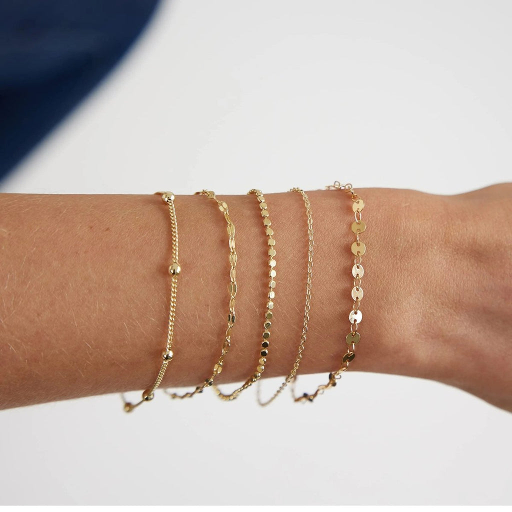 Zarte Gold 5-Lagen Punktarmbänder | Shop Nory