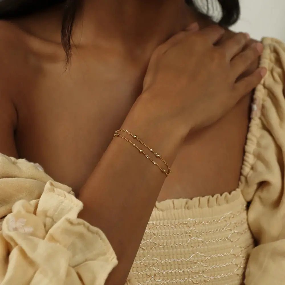 Zarte Goldperlenarmbänder | Shop Nory