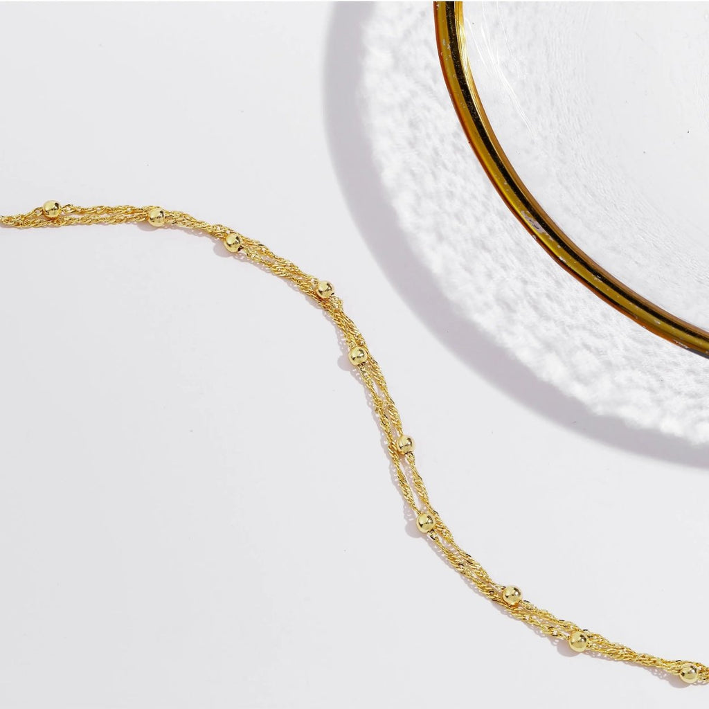 Zarte Goldperlenarmbänder | Shop Nory