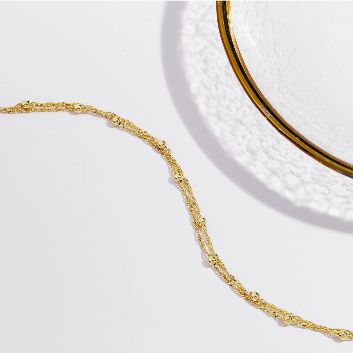 Zarte Goldperlenarmbänder | Shop Nory