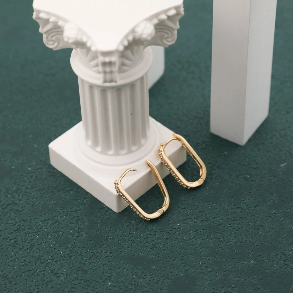 Gold CZ Huggie Hoop Ohrringe | Shop Nory