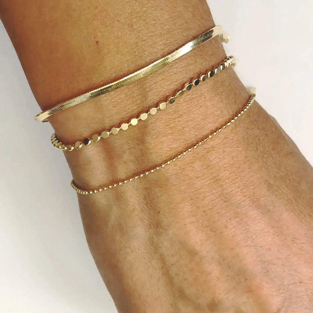 Geschichtete vergoldete Punktarmbänder | Shop Nory