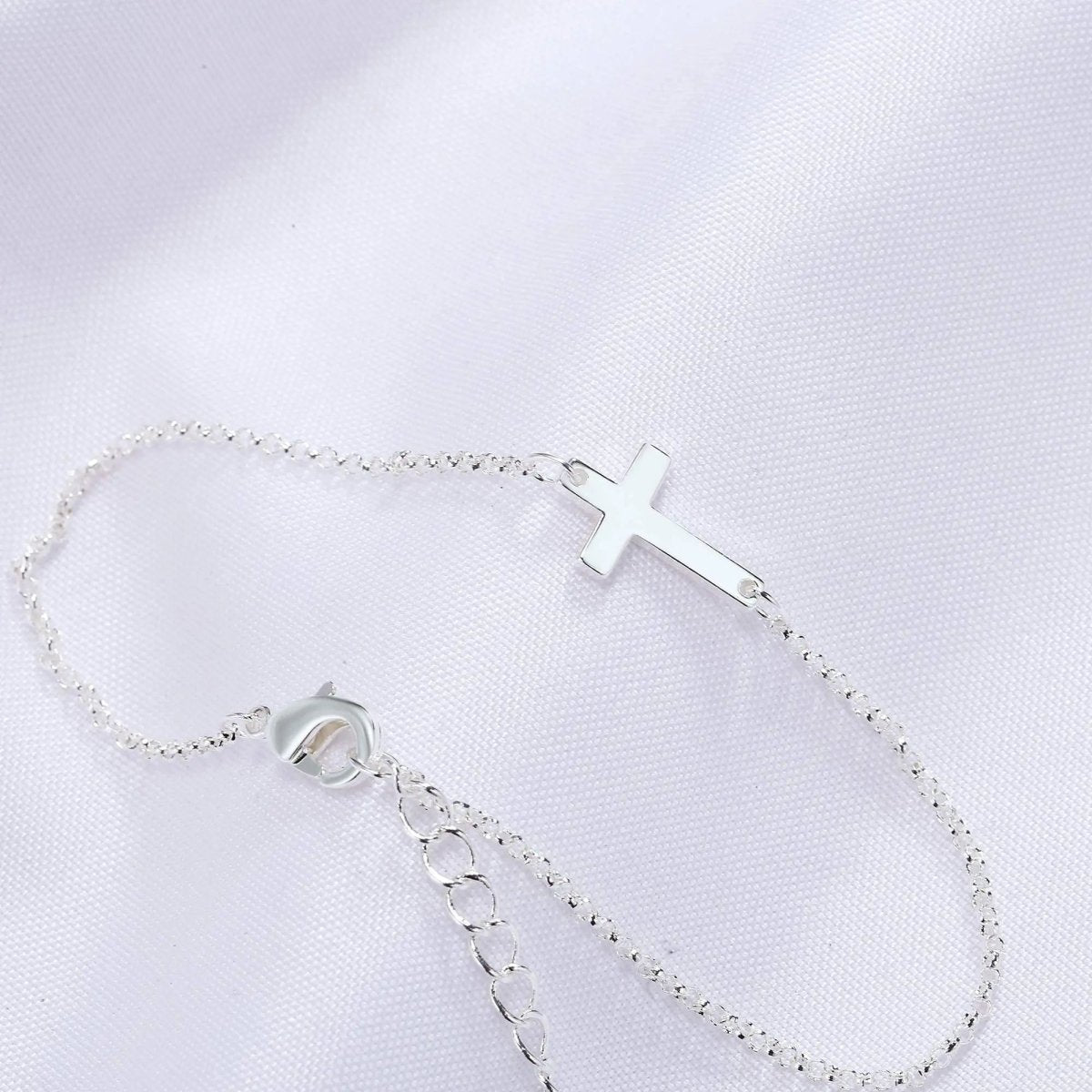Silberne Kreuzarmbänder | Shop Nory