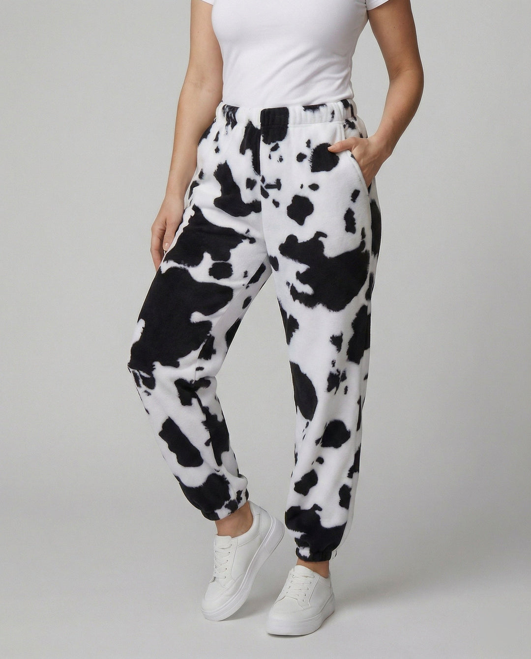 Damen Freizeithose im lässigen Cow-Print-Design mit elastischem Bund und Bündchen