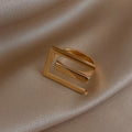 Minimalistischer Stil Quadrat Rund Hohlring | Shop Nory