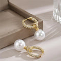 Elegante, kleine Creolen mit Zirkoniasteinen und weisser Perle in Edelstahl -18k vergoldet | Shop Nory