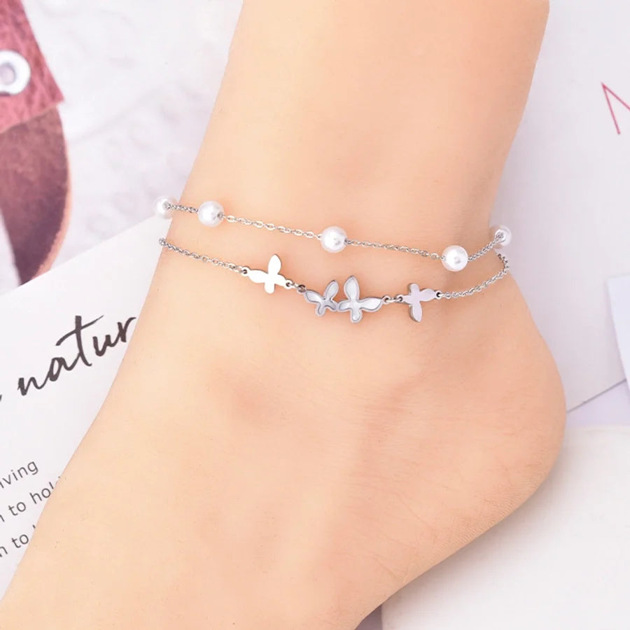 Fusskette Schmetterling mit weissen Perlen in gold oder silber | Shop Nory