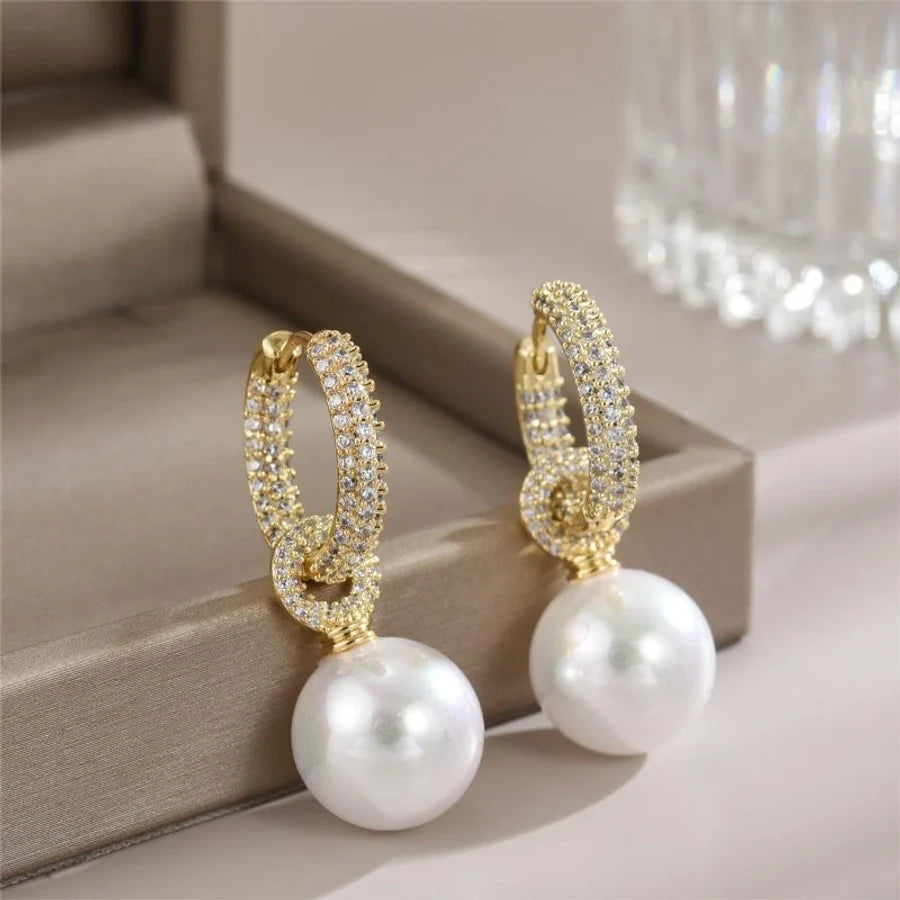 Elegante, kleine Creolen mit Zirkoniasteinen und weisser Perle in Edelstahl -18k vergoldet | Shop Nory