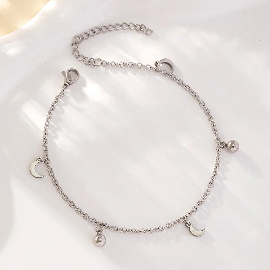 Fusskette mit Sonne und Mond Anhängern in Edelstahl - silber | Shop Nory