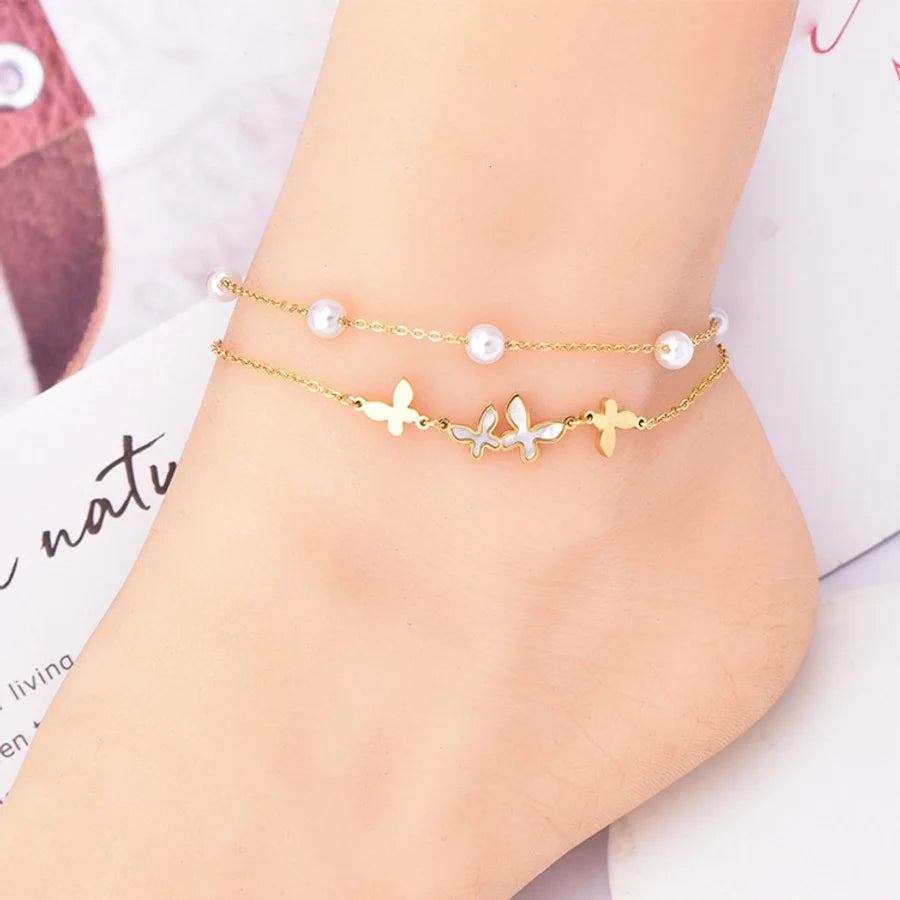 Fusskette Schmetterling mit weissen Perlen in gold oder silber | Shop Nory