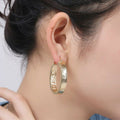 Goldfarbene ovale hochglanzpolierte Retro Great Wall Creolen | Shop Nory