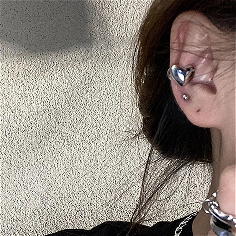 Silberfarbene Liebesherz Clip-On Ohrringe | Shop Nory